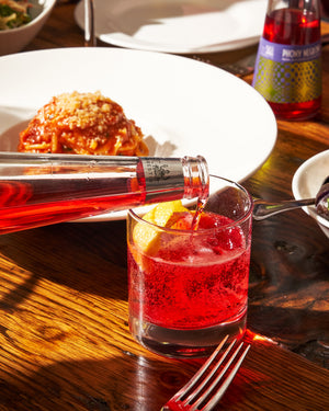 St. Agrestis Phony Negroni being poured at a restaurant table