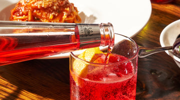 St. Agrestis Phony Negroni being poured at a restaurant table