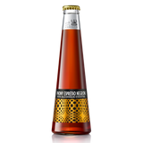 Virgin espresso negroni bottled non-alcoholic cocktail in a tall amber glass with gold and black patterned label.